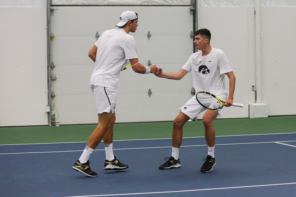 Iowa’s Joe Tyler and Matt Clegg celebrate a point during the Iowa men’s tennis match vs Western Michigan on Saturday, January 18, 2020 at the Hawkeye Tennis and Recreation Complex. (Lily Smith/hawkeyesports.com)
