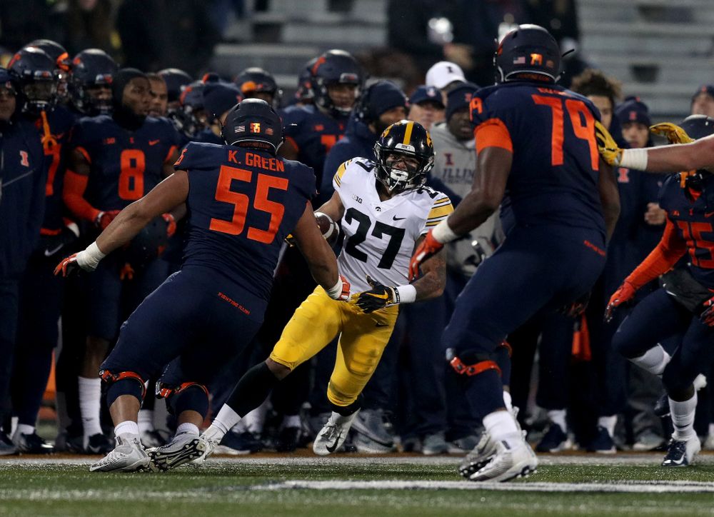Iowa Hawkeyes defensive back Amani Hooker (27) intercepts a pass against the Illinois Fighting Illini Saturday, November 17, 2018 at Memorial Stadium in Champaign, Ill. (Brian Ray/hawkeyesports.com)