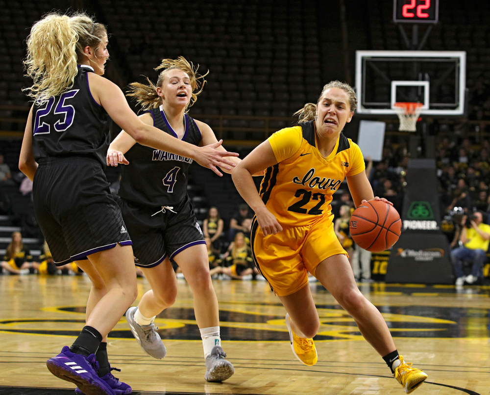 Iowa guard Kathleen Doyle (22) drives with the ball during the fourth quarter of their game against Winona State at Carver-Hawkeye Arena in Iowa City on Sunday, Nov 3, 2019. (Stephen Mally/hawkeyesports.com)