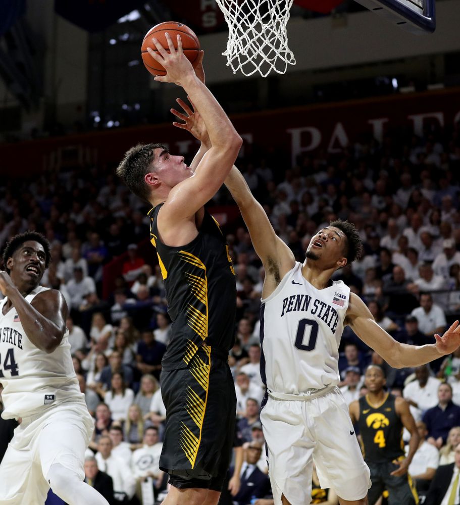 Iowa Hawkeyes forward Luka Garza (55) goes to the hoop against Penn State Saturday, January 4, 2020 at the Palestra in Philadelphia. (Brian Ray/hawkeyesports.com)