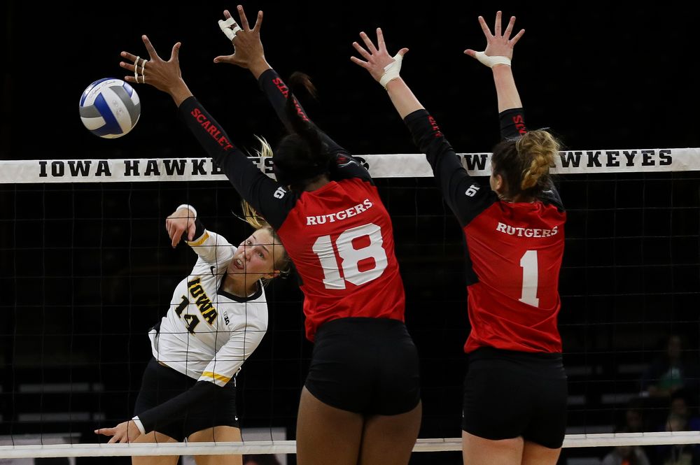 Iowa Hawkeyes outside hitter Cali Hoye (14) spikes the ball during a match against Rutgers at Carver-Hawkeye Arena on November 2, 2018. (Tork Mason/hawkeyesports.com)