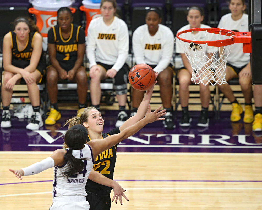 Iowa Hawkeyes guard Kathleen Doyle (22) makes a basket during the fourth quarter of their game at Welsh-Ryan Arena in Evanston, Ill. on Sunday, January 5, 2020. (Stephen Mally/hawkeyesports.com)