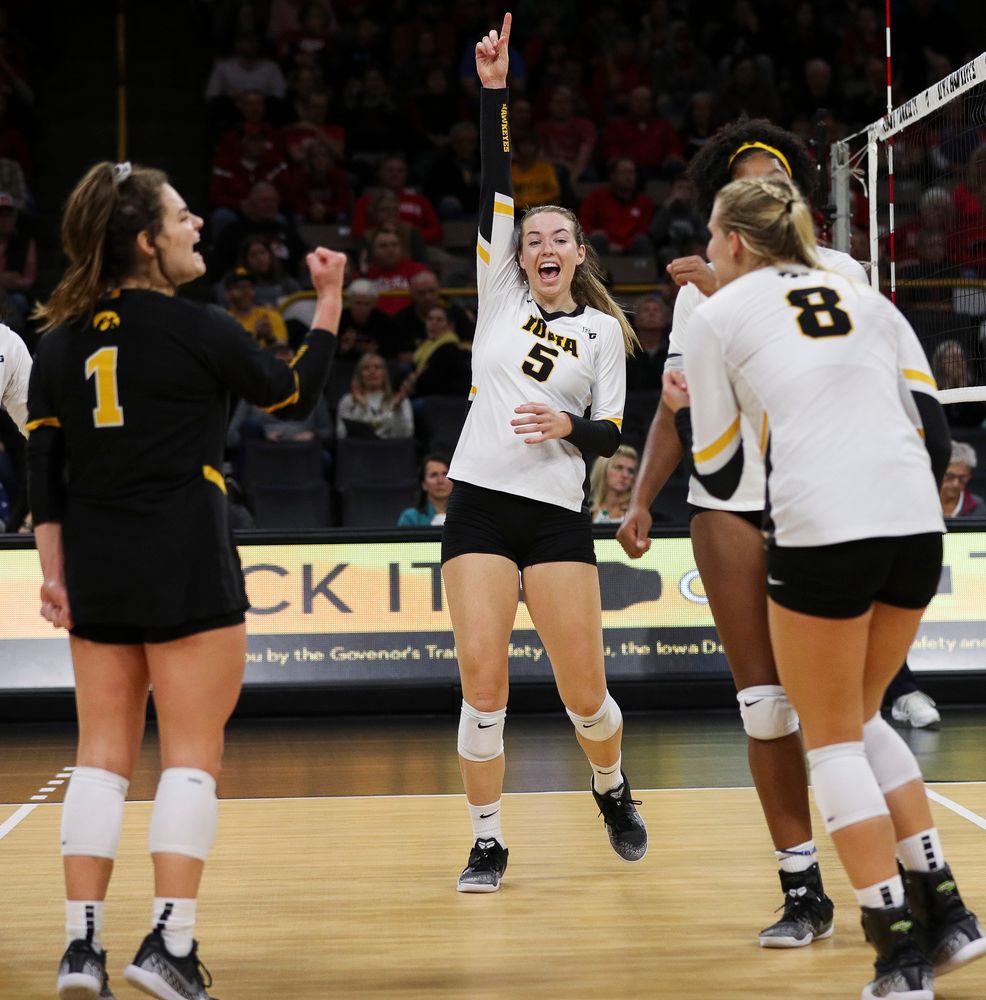 Iowa Hawkeyes outside hitter Meghan Buzzerio (5) celebrates after winning a point during a match against Nebraska at Carver-Hawkeye Arena on November 7, 2018. (Tork Mason/hawkeyesports.com)