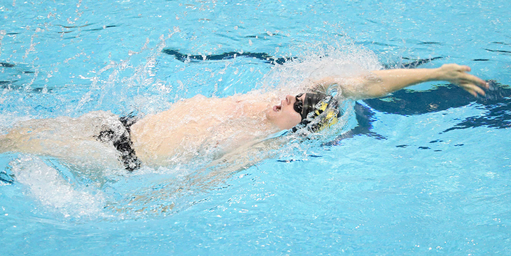Iowa’s Jacob Rosenkoetter swims the men’s 100-yard backstroke event during their meet against Michigan State and Northern Iowa at the Campus Recreation and Wellness Center in Iowa City on Friday, Oct 4, 2019. (Stephen Mally/hawkeyesports.com)