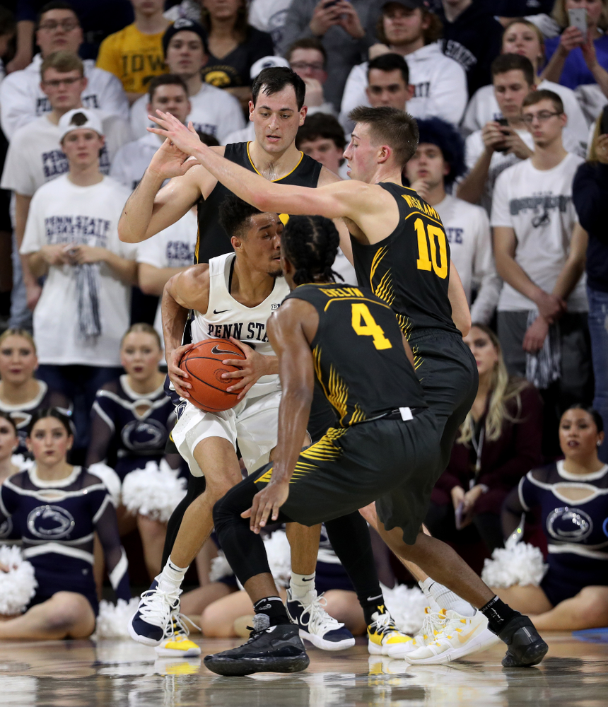 Iowa Hawkeyes forward Ryan Kriener (15), guard Joe Wieskamp (10), and guard Bakari Evelyn (4) against Penn State Saturday, January 4, 2020 at the Palestra in Philadelphia. (Brian Ray/hawkeyesports.com)