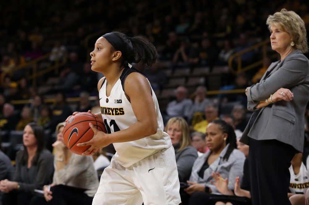 Iowa Hawkeyes guard Tania Davis (11) against the Wisconsin Badgers Monday, January 7, 2019 at Carver-Hawkeye Arena. (Brian Ray/hawkeyesports.com)