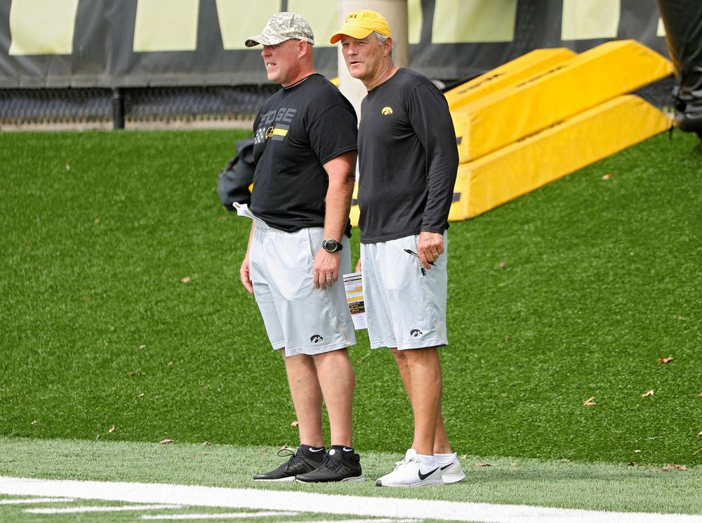 Iowa Hawkeyes strength and conditioning coordinator Chris Doyle and head coach Kirk Ferentz look on during Fall Camp Practice No. 10 at the Hansen Football Performance Center in Iowa City on Tuesday, Aug 13, 2019. (Stephen Mally/hawkeyesports.com)