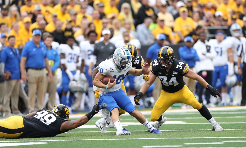 Iowa Hawkeyes defensive lineman Noah Shannon (99) and linebacker Kristian Welch (34) against Middle Tennessee State Saturday, September 28, 2019 at Kinnick Stadium. (Max Allen/hawkeyesports.com)