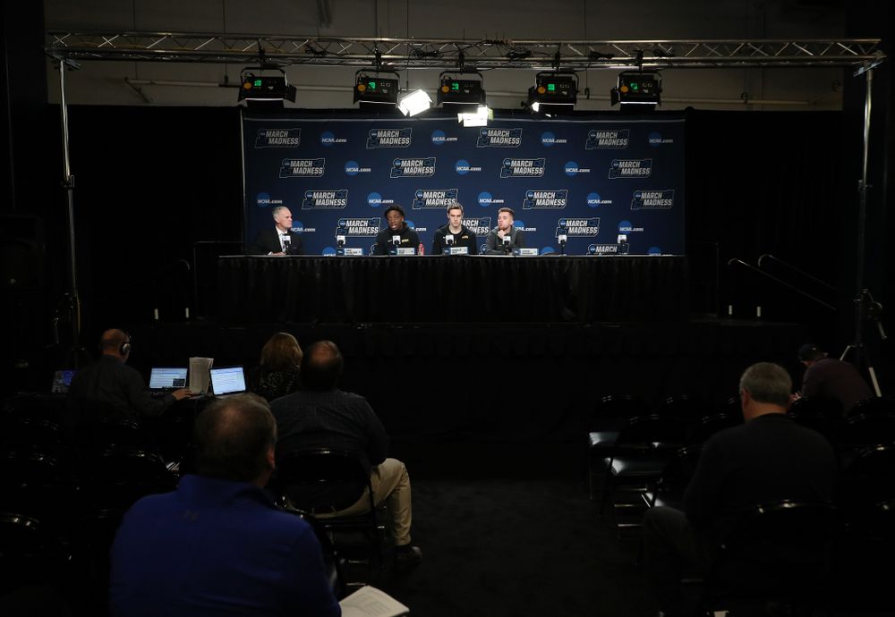 Iowa Hawkeyes forward Tyler Cook (25), forward Nicholas Baer (51), and guard Jordan Bohannon (3) during press availability and practice before the first round of the 2019 NCAA Men's Basketball Tournament Thursday, March 21, 2019 at Nationwide Arena in Columbus, Ohio. (Brian Ray/hawkeyesports.com)