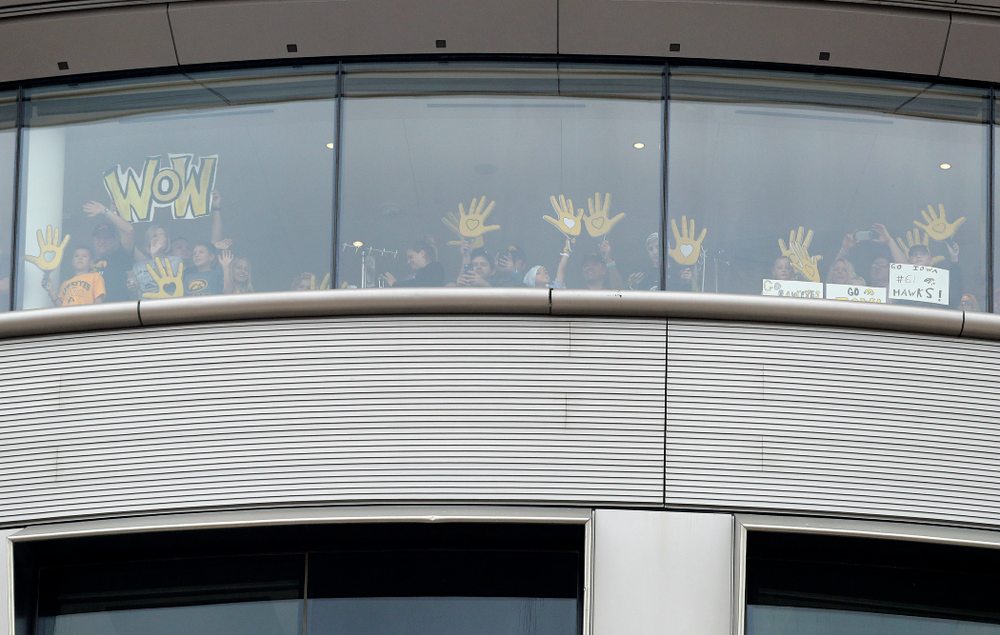People in the University of Iowa Stead Family Children's Hospital wave back between the first and second quarter of their game at Kinnick Stadium in Iowa City on Saturday, Sep 28, 2019. (Stephen Mally/hawkeyesports.com)