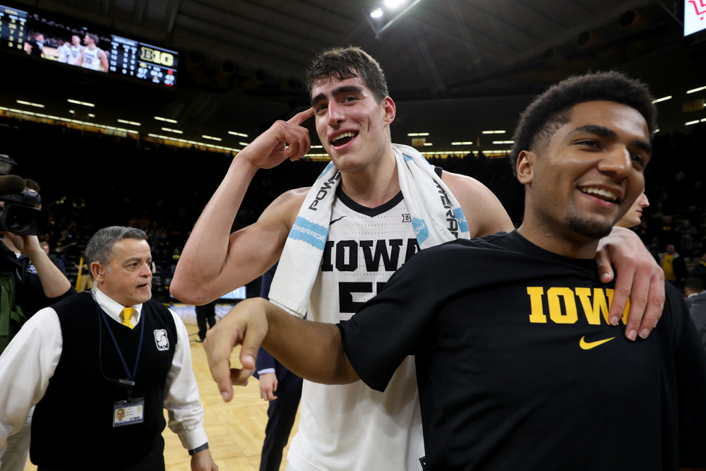 Iowa Hawkeyes forward Luka Garza (55) and guard Nicolas Hobbs (24) against the Maryland Terrapins Friday, January 10, 2020 at Carver-Hawkeye Arena. (Brian Ray/hawkeyesports.com)