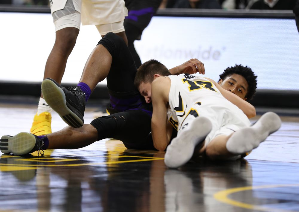 Iowa Hawkeyes guard Austin Ash (13) against the Western Carolina Catamounts Tuesday, December 18, 2018 at Carver-Hawkeye Arena. (Brian Ray/hawkeyesports.com)