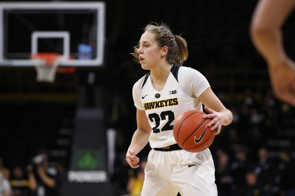 Iowa Hawkeyes guard Kathleen Doyle (22) against the Wisconsin Badgers Monday, January 7, 2019 at Carver-Hawkeye Arena. (Brian Ray/hawkeyesports.com)