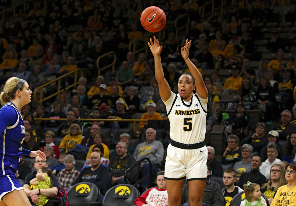 Iowa Hawkeyes guard Alexis Sevillian (5) makes a 3-pointer during the first quarter of their game at Carver-Hawkeye Arena in Iowa City on Saturday, December 21, 2019. (Stephen Mally/hawkeyesports.com)