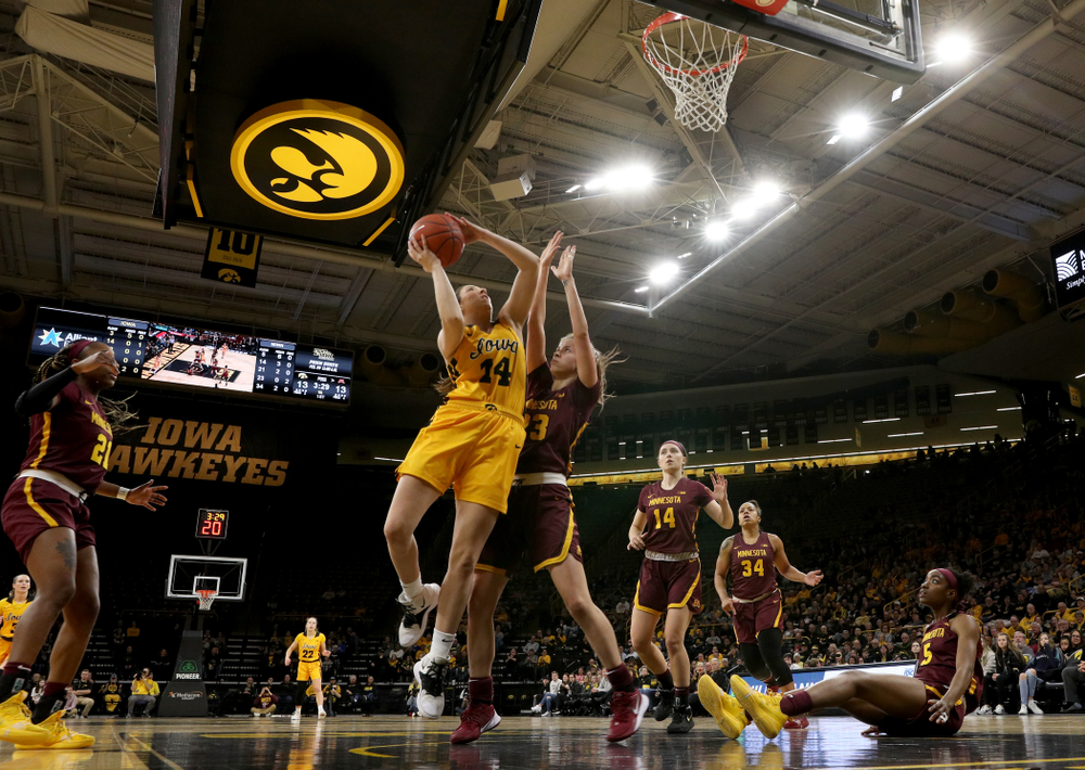 Iowa Hawkeyes forward McKenna Warnock (14) against the Minnesota Golden Gophers Thursday, February 27, 2020 at Carver-Hawkeye Arena. (Brian Ray/hawkeyesports.com)