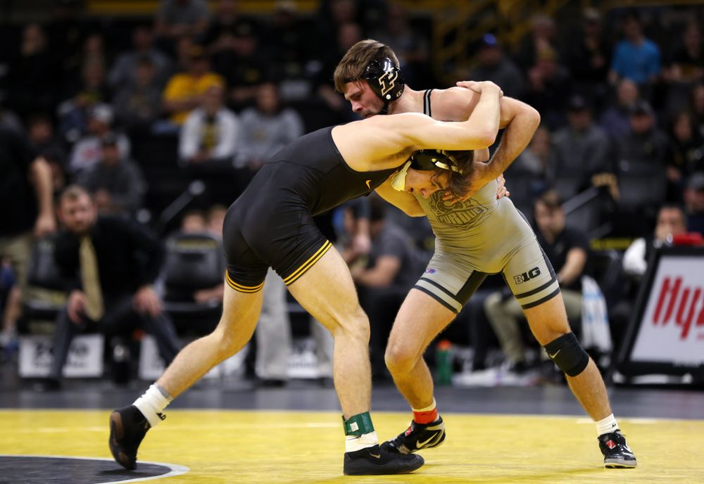 Iowa's Austin DeSanto wrestles Purdue's Ben Thornton at 133 pounds Saturday, November 24, 2018 at Carver-Hawkeye Arena. (Brian Ray/hawkeyesports.com)