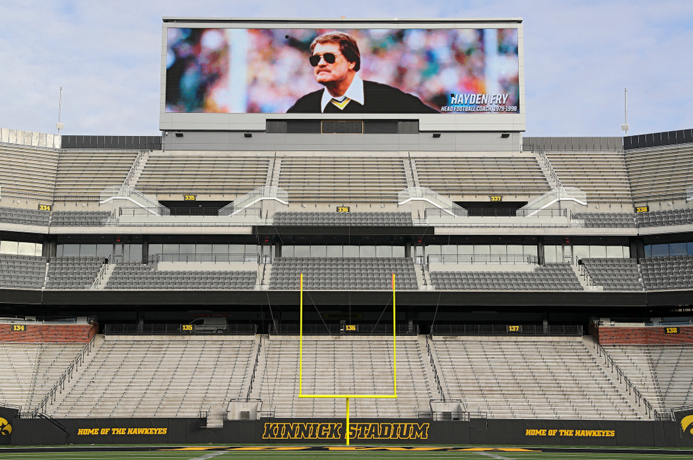 A picture of Hayden Fry is shown on the video boards at Kinnick Stadium in Iowa City on Wednesday, December 18, 2019. Hayden Fry passed away on Dec. 17, at the age of 90. (Stephen Mally/hawkeyesports.com)