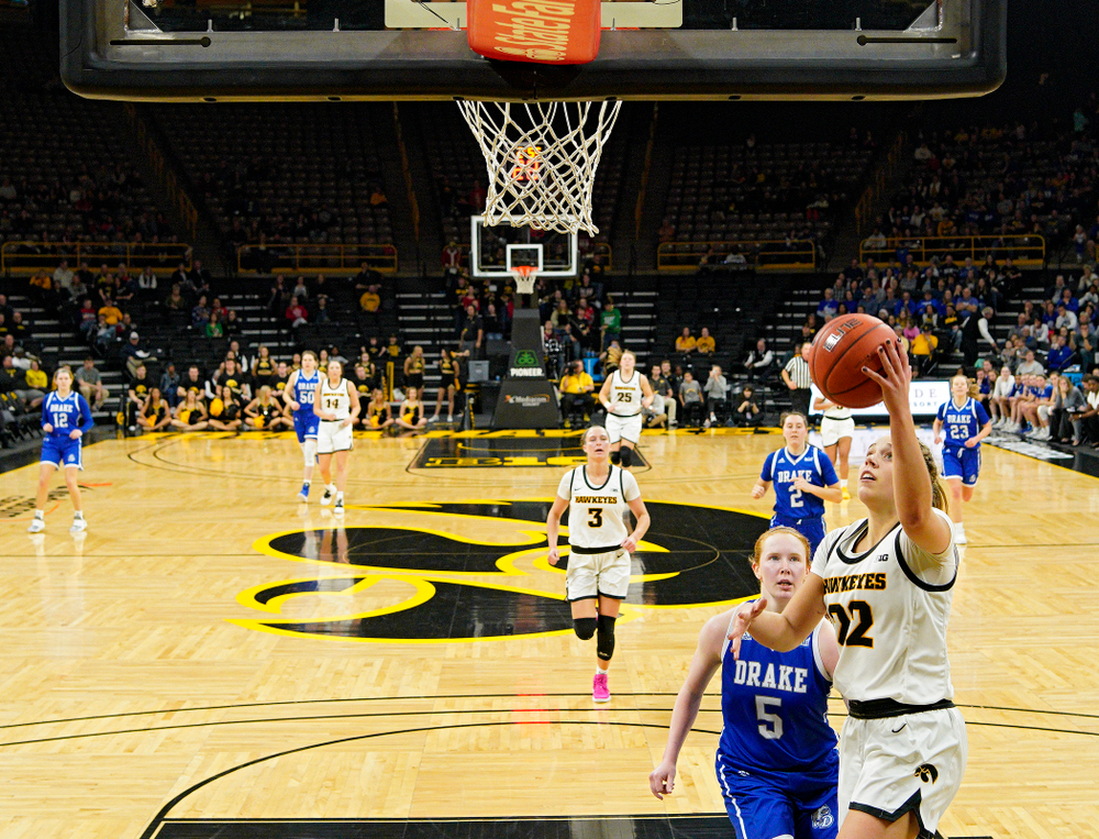 Iowa Hawkeyes guard Kathleen Doyle (22) makes a basket during the fourth quarter of their game at Carver-Hawkeye Arena in Iowa City on Saturday, December 21, 2019. (Stephen Mally/hawkeyesports.com)