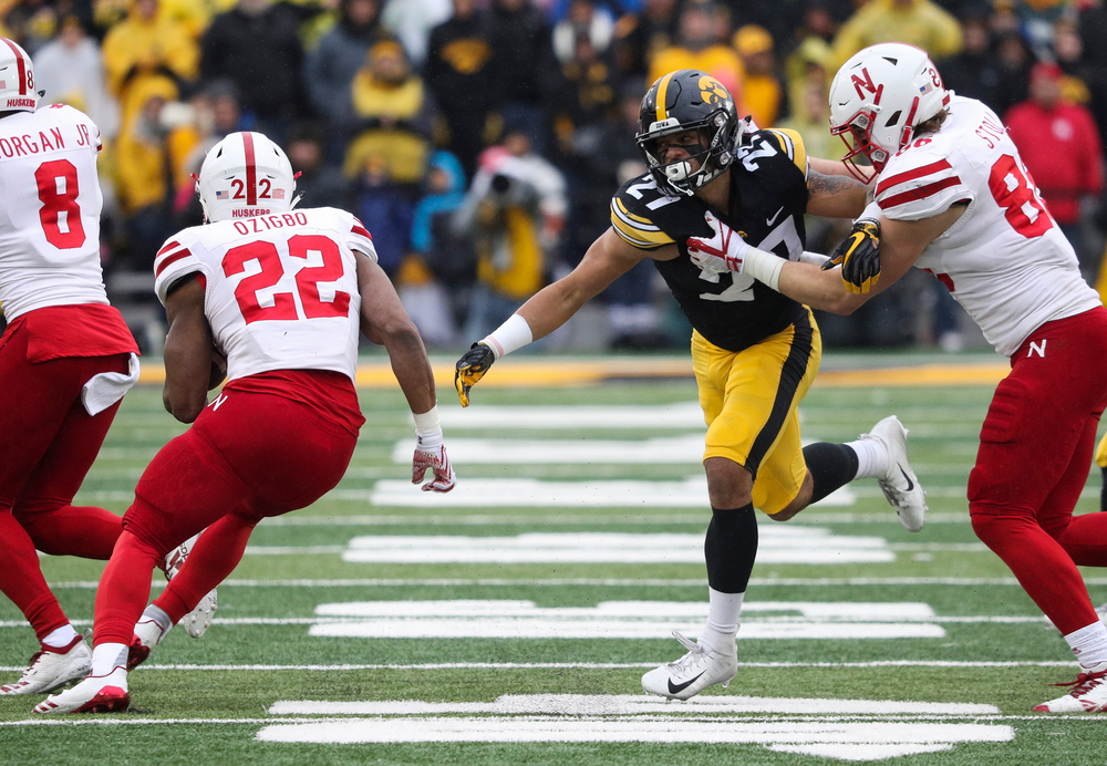 Iowa Hawkeyes defensive back Amani Hooker (27) fights off a block during a game against Nebraska at Kinnick Stadium on November 23, 2018. (Tork Mason/hawkeyesports.com)
