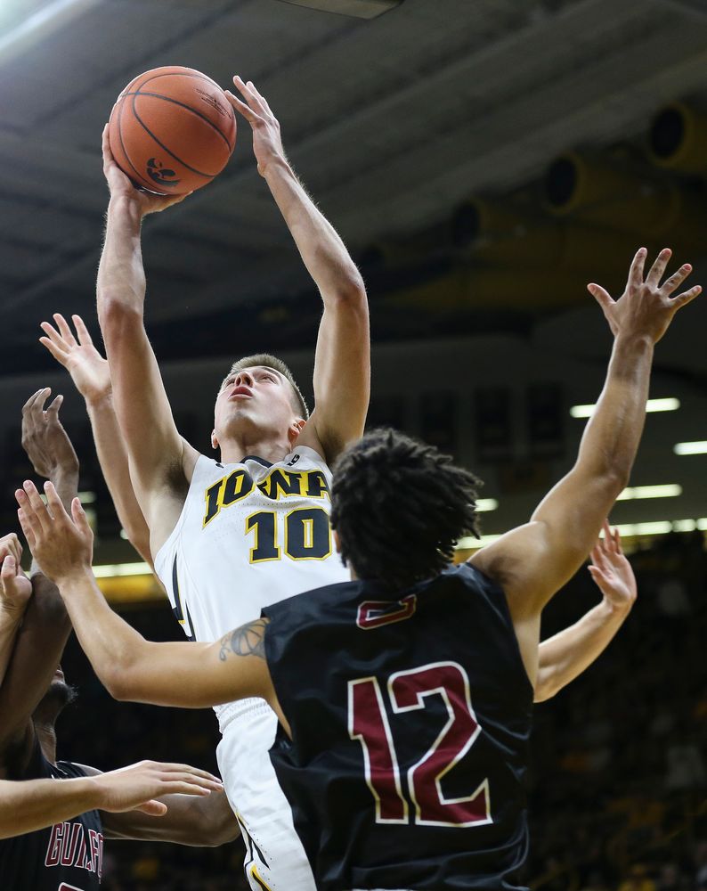 Iowa Hawkeyes guard Joe Wieskamp (10) goes up for a shot near the rim during a game against Guilford College at Carver-Hawkeye Arena on November 4, 2018. (Tork Mason/hawkeyesports.com)
