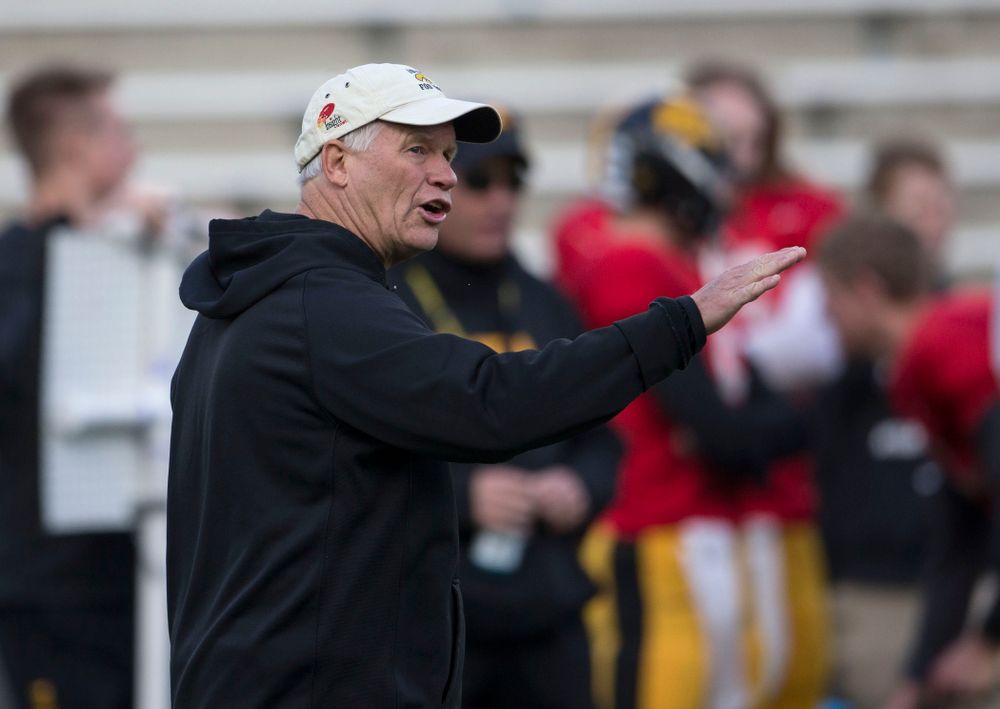 Iowa Hawkeyes defensive line coach Reese Morgan works with his unit during spring practice Wednesday, April 16, 2014 at the Kinnick Stadium in Iowa City. (Brian Ray/hawkeyesports.com)