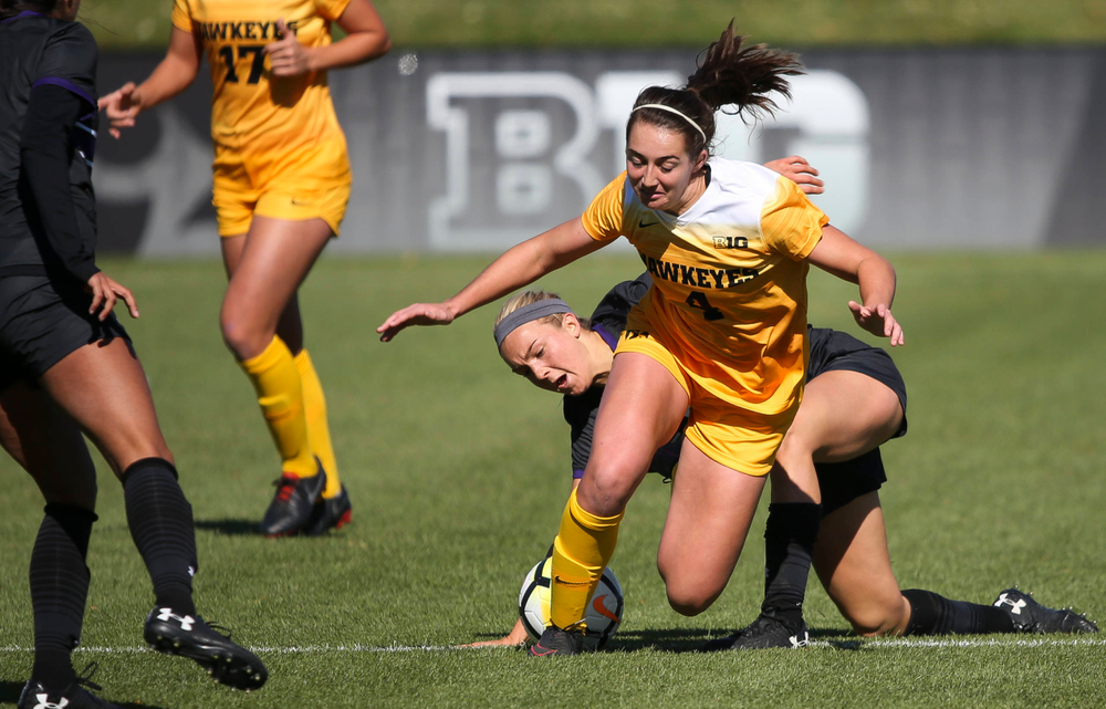 Iowa Hawkeyes forward Kaleigh Haus (4) is fouled during a game against Northwestern at the Iowa Soccer Complex on October 21, 2018. (Tork Mason/hawkeyesports.com)