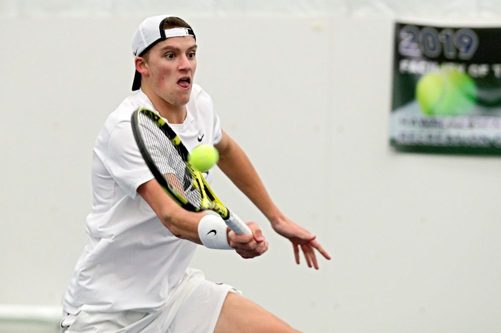 Iowa’s Joe Tyler returns a shot during his singles match at the Hawkeye Tennis and Recreation Complex in Iowa City on Sunday, February 16, 2020. (Stephen Mally/hawkeyesports.com)