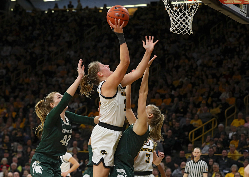 Iowa Hawkeyes forward Monika Czinano (25) makes a basket during the third quarter of their game at Carver-Hawkeye Arena in Iowa City on Sunday, January 26, 2020. (Stephen Mally/hawkeyesports.com)