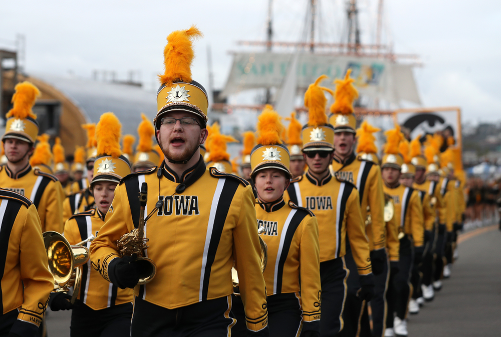 The Hawkeye Marching Band and the Iowa Spirit Squad march in the Holiday Bowl Parade Thursday, December 26, 2019 in San Diego. (Brian Ray/hawkeyesports.com)