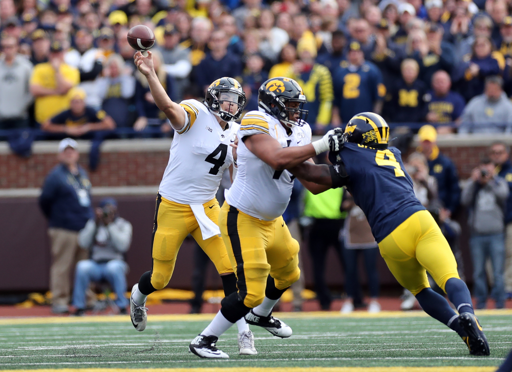 Iowa Hawkeyes quarterback Nate Stanley (4) against the Michigan Wolverines Saturday, October 5, 2019 at Michigan Stadium in Ann Arbor, MI. (Brian Ray/hawkeyesports.com)