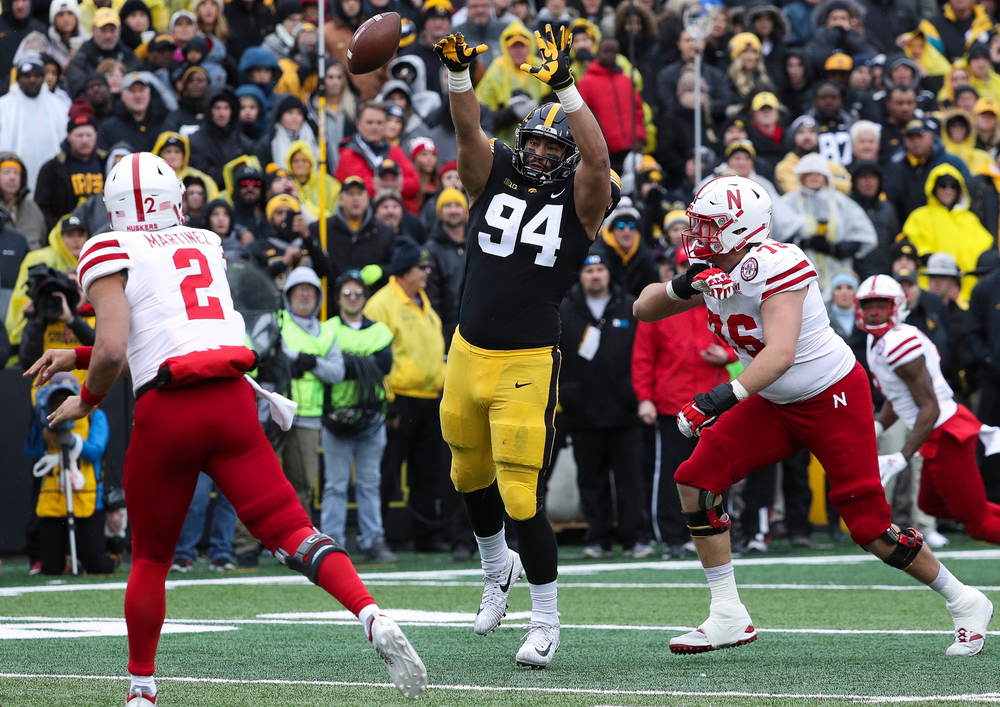 Iowa Hawkeyes defensive end A.J. Epenesa (94) bats down a pass during a game against Nebraska at Kinnick Stadium on November 23, 2018. (Tork Mason/hawkeyesports.com)