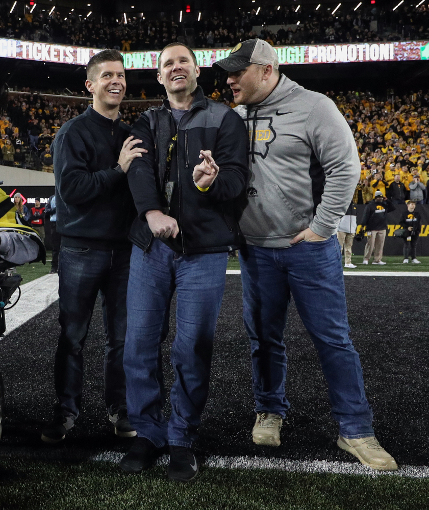 Former Hawkeyes Joe Conklin, Brett Greenwood, and Pat Angerer are recognized with the rest of the 2009 team during the Iowa Hawkeyes game against the Penn State Nittany Lions Saturday, October 12, 2019 at Kinnick Stadium. (Brian Ray/hawkeyesports.com)