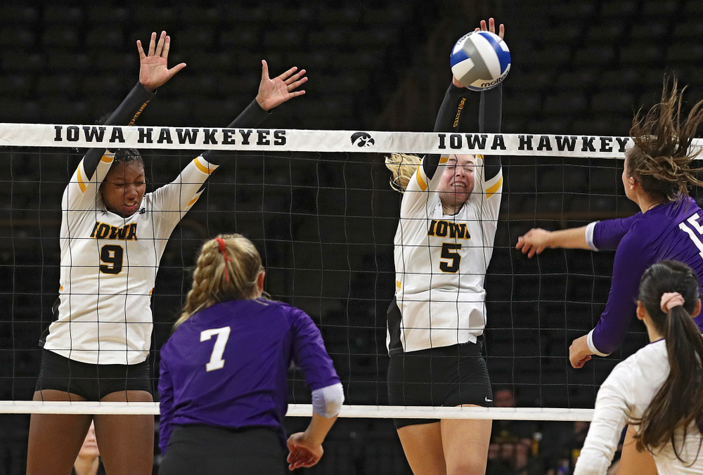 Iowa’s Meghan Buzzerio (5) blocks a shot as Amiya Jones (9) looks on during their Big Ten/Pac-12 Challenge match at Carver-Hawkeye Arena in Iowa City on Saturday, Sep 7, 2019. (Stephen Mally/hawkeyesports.com)