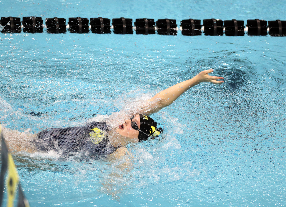 IowaÕs Emilia Sansome swims the 200 yard backstroke against the Michigan Wolverines Friday, November 1, 2019 at the Campus Recreation and Wellness Center. (Brian Ray/hawkeyesports.com)