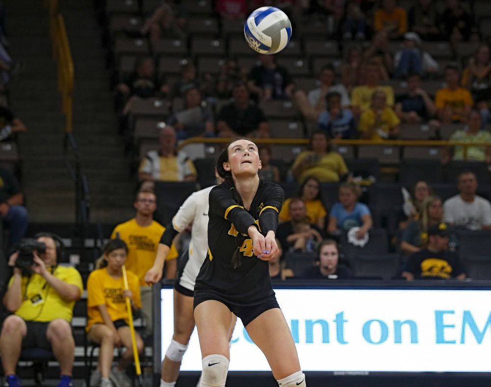 Iowa’s Halle Johnston (4) eyes the ball during the third set of their Big Ten/Pac-12 Challenge match against Colorado at Carver-Hawkeye Arena in Iowa City on Friday, Sep 6, 2019. (Stephen Mally/hawkeyesports.com)