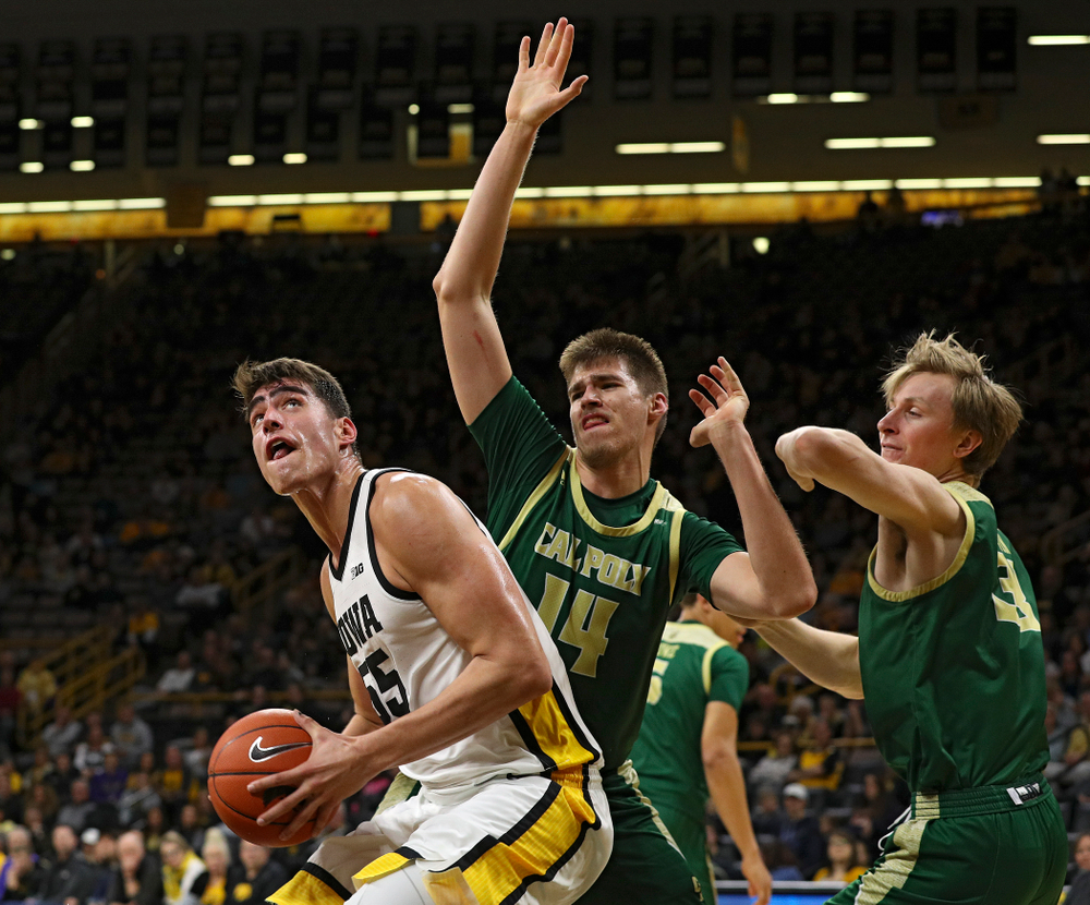 Iowa Hawkeyes center Luka Garza (55) eyes the basket during the first half of their game at Carver-Hawkeye Arena in Iowa City on Sunday, Nov 24, 2019. (Stephen Mally/hawkeyesports.com)