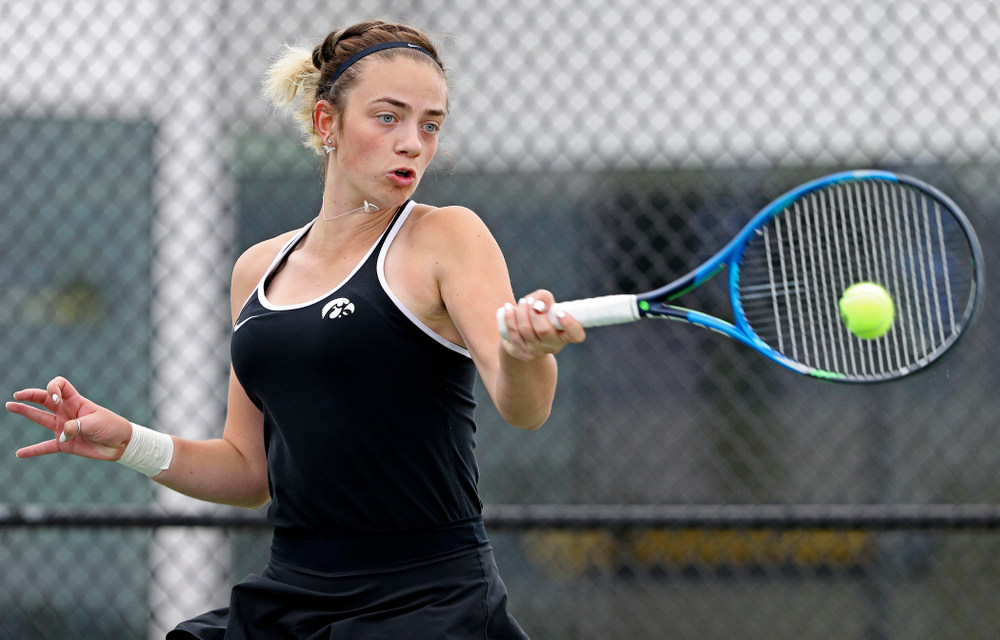Iowa's Sophie Clark returns a shot during their doubles match against Rutgers at the Hawkeye Tennis and Recreation Complex in Iowa City on Friday, Apr. 5, 2019. (Stephen Mally/hawkeyesports.com)
