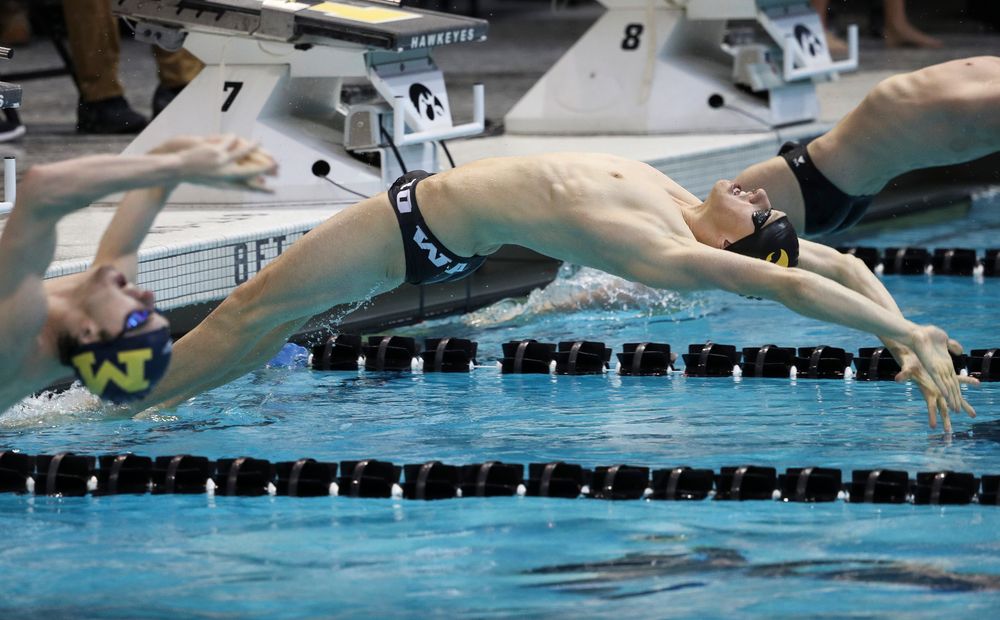 Iowa's John Colin competes in the 200-yard backstroke during a meet against Michigan and Denver at the Campus Recreation and Wellness Center on November 3, 2018. (Tork Mason/hawkeyesports.com)