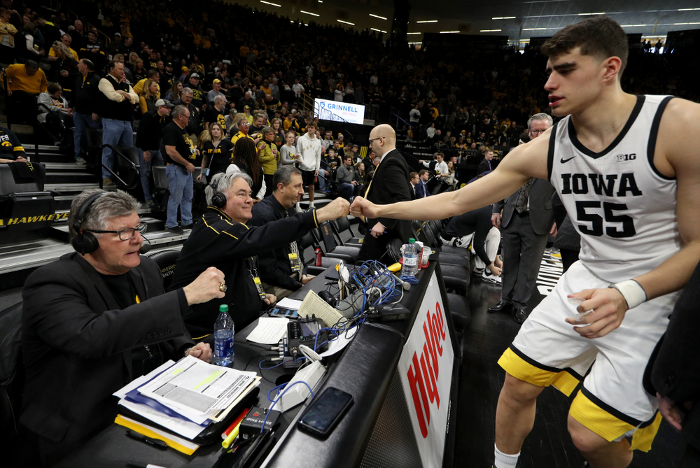Iowa Hawkeyes forward Luka Garza (55) fist bumps the radio crew before their game against Penn State Saturday, February 29, 2020 at Carver-Hawkeye Arena. (Brian Ray/hawkeyesports.com)