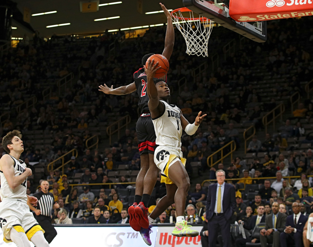 Iowa Hawkeyes guard Joe Toussaint (1) scores a basket during the second half of their game at Carver-Hawkeye Arena in Iowa City on Friday, Nov 8, 2019. (Stephen Mally/hawkeyesports.com)