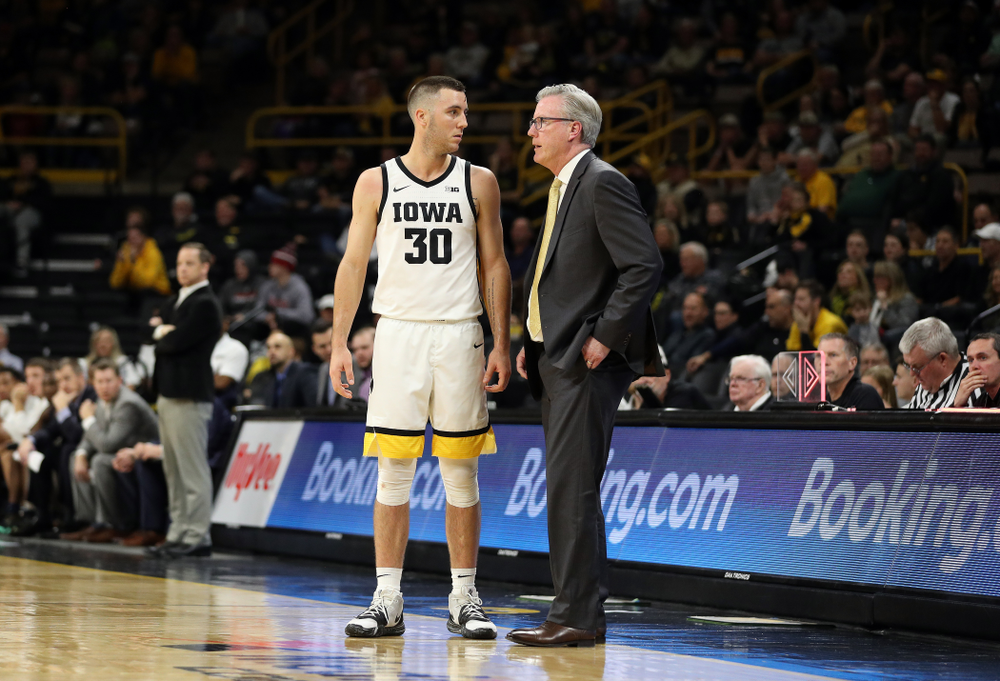 Iowa Hawkeyes head coach Fran McCaffery and guard Connor McCaffery (30) against Oral Roberts Friday, November 15, 2019 at Carver-Hawkeye Arena. (Brian Ray/hawkeyesports.com)