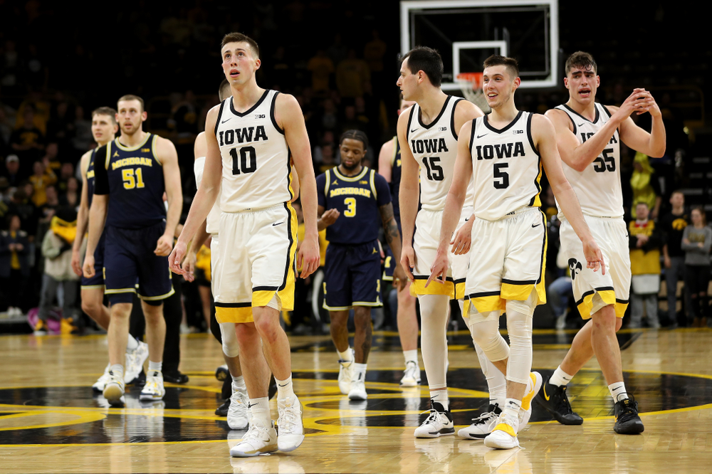 Iowa Hawkeyes guard Joe Wieskamp (10), forward Ryan Kriener (15), guard CJ Fredrick (5), and forward Luka Garza (55) against the Michigan Wolverines Friday, January 17, 2020 at Carver-Hawkeye Arena. (Brian Ray/hawkeyesports.com)