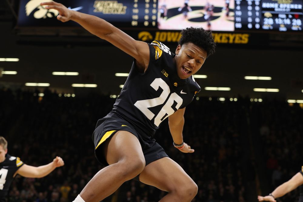 The Iowa Dance Team performs with the Iowa Football Team at halftime of the Iowa Hawkeyes game against the Indiana Hoosiers Friday, February 22, 2019 at Carver-Hawkeye Arena. (Brian Ray/hawkeyesports.com)