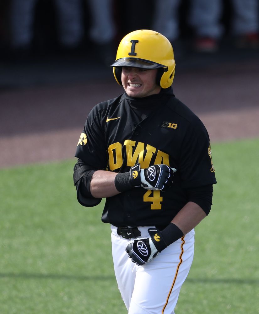 Iowa Hawkeyes infielder Mitchell Boe (4) reacts after hitting a game tying three-run homer against California State Northridge Sunday, March 17, 2019 at Duane Banks Field. (Brian Ray/hawkeyesports.com)