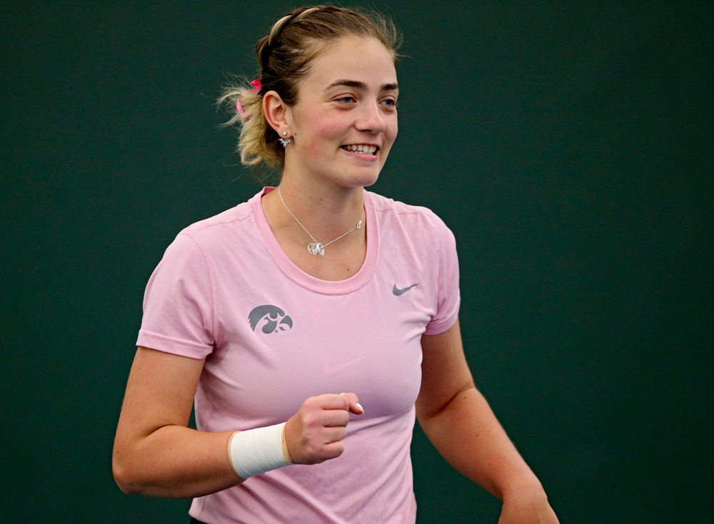 Iowa's Sophie Clark celebrates a score during their doubles match against Purdue at the Hawkeye Tennis and Recreation Complex in Iowa City on Friday, Mar. 29, 2019. (Stephen Mally/hawkeyesports.com)