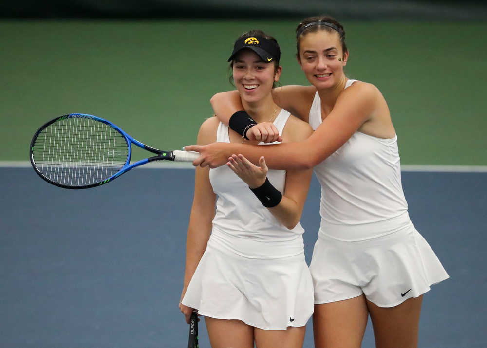 Samantha Mannix and Sophie Clark celebrate after winning a doubles match during the second day of the ITA Central Regional Championships at the Hawkeye Tennis and Recreation Complex on October 13, 2018. (Tork Mason/hawkeyesports.com)