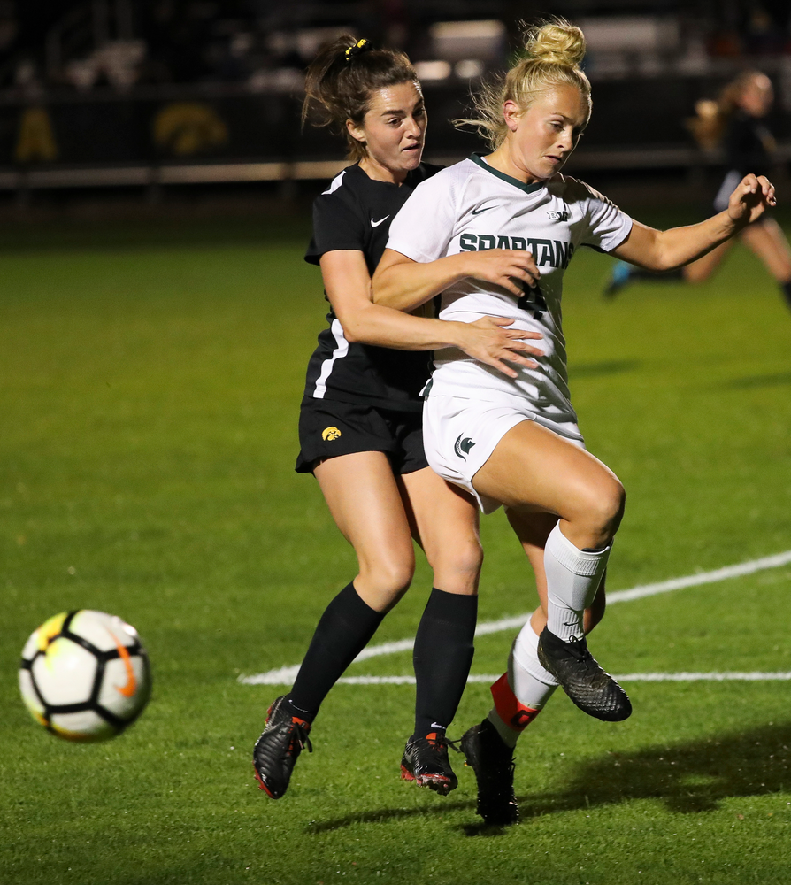 Iowa Hawkeyes forward Devin Burns (30) fights for possession during a game against Michigan State at the Iowa Soccer Complex on October 12, 2018. (Tork Mason/hawkeyesports.com)