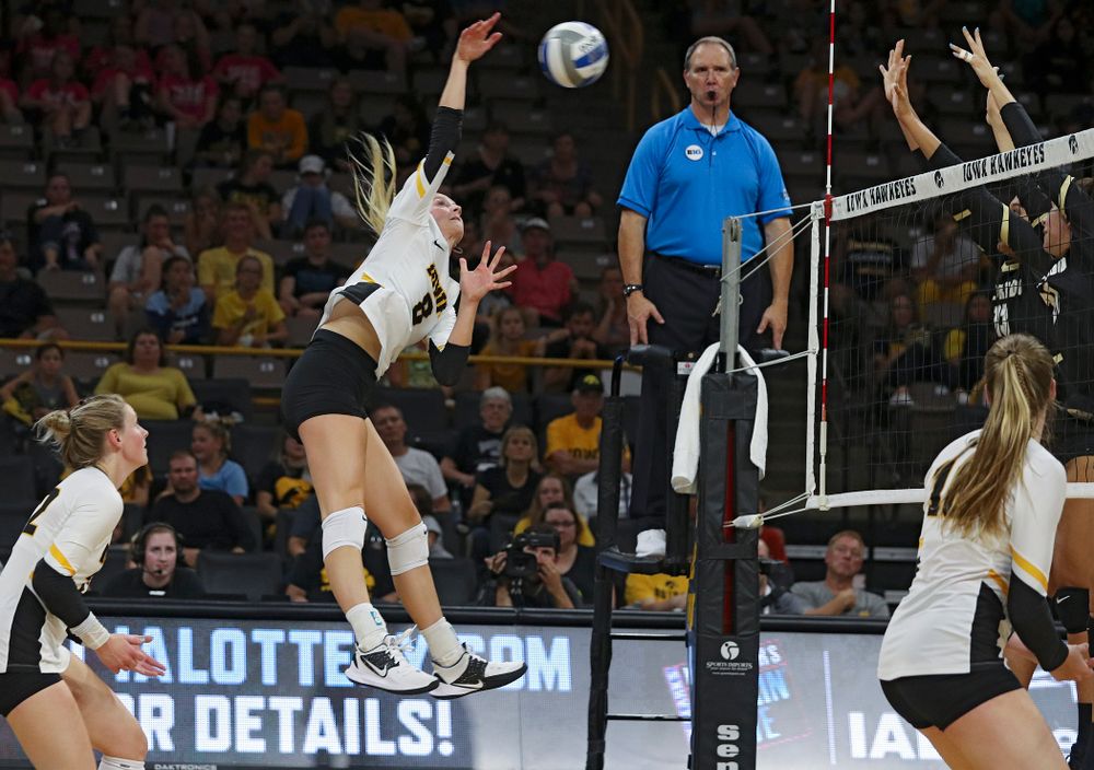 Iowa’s Kyndra Hansen (8) gets up for a kill during the third set of their Big Ten/Pac-12 Challenge match against Colorado at Carver-Hawkeye Arena in Iowa City on Friday, Sep 6, 2019. (Stephen Mally/hawkeyesports.com)
