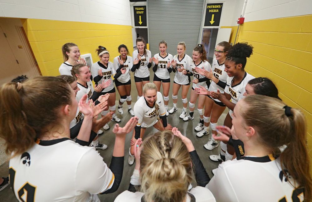 Iowa’s Maddie Slagle (15) dances in their huddle before their Big Ten/Pac-12 Challenge match against Colorado at Carver-Hawkeye Arena in Iowa City on Friday, Sep 6, 2019. (Stephen Mally/hawkeyesports.com)