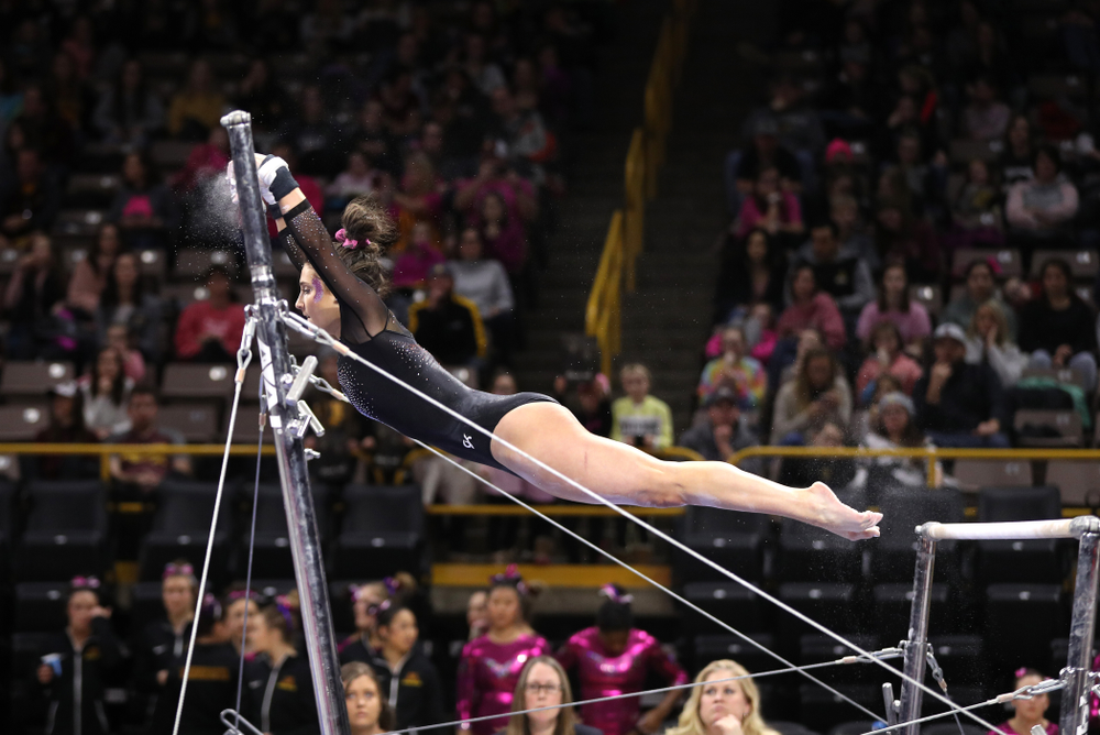 Iowa's Jax Krantz competes on the bars during their meet against the Minnesota Golden Gophers Saturday, January 19, 2019 at Carver-Hawkeye Arena. (Brian Ray/hawkeyesports.com)